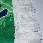 fanschal grün detailaufnahme